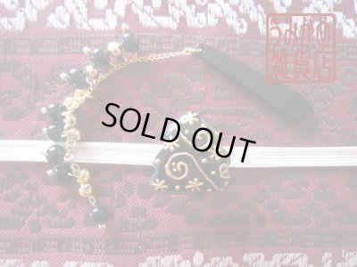 帯地・帯締め上の参考画像（帯地・帯締めは商品に含まれません）