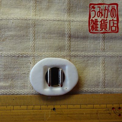 赤べこの帯留め