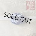 笑う白龍の帯留め（ブルー地）