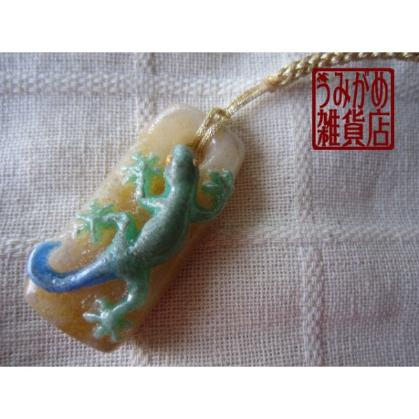 ヤモリの帯飾り