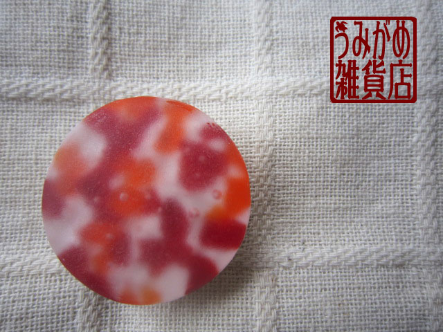 画像: ボンボンキャンディの帯留め(赤オレンジマーブル）